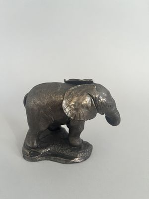 A Lenox Princeton Gallery Pewter Elephant Figurine. Pewter elephant figurine, depicting a young 