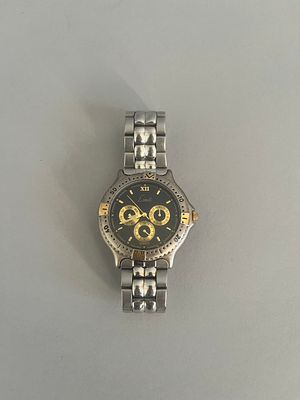 A Limit Men's Multi-Dial Quartz Watch with Black Dial and Day-Date functions, likely dating 