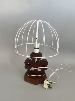 A Decorative Wooden Table Lamp with Trefoil Base and Metal Shade Frame. This table lamp 