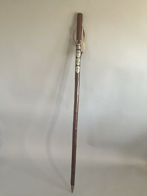 A Vintage German Wanderstock Hiking Stick, featuring a polished, natural branch-form shaft 
