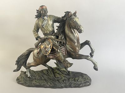 A 'Top Collection Geronimo Going to Battle' sculptural figurine, depicting a Native 