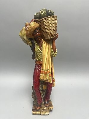 A hand-painted Bossons 'Peon' English Artware figurine, copyrighted 1966, depicting a male 