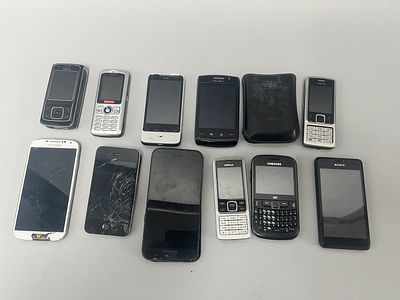 Collection of mobile phones. A Samsung S3350 (also known as Samsung Chat 335) with WIFI and 