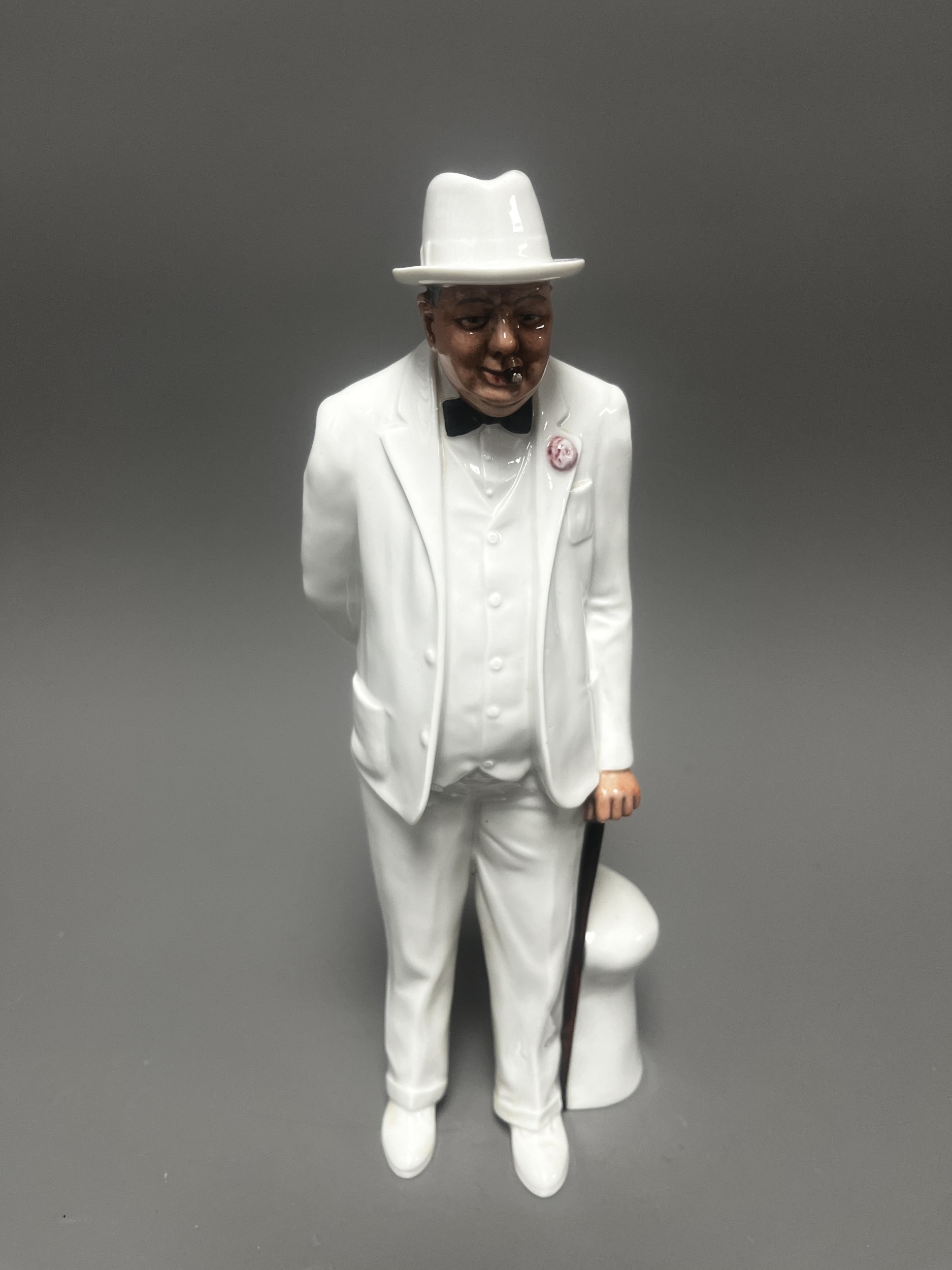 A ROYAL DOULTON bone china figure of Sir Winston Churchill