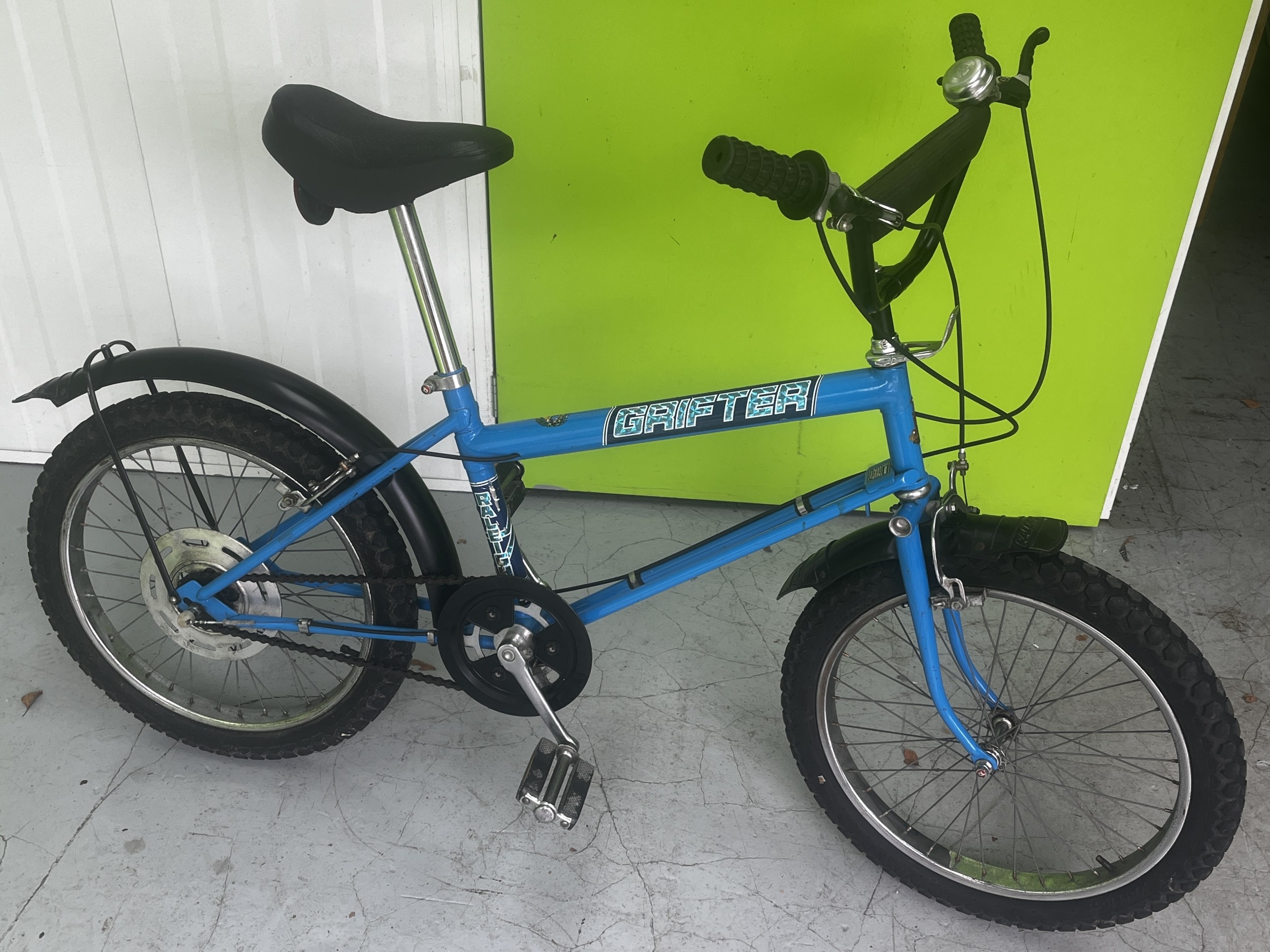 A vintage 1981 MK2 Raleigh Grifter Blue Boys Bicycle with holographic-style