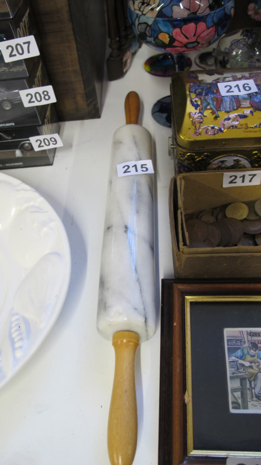 Lot 215: Dangerous weapon. Marble rolling pin