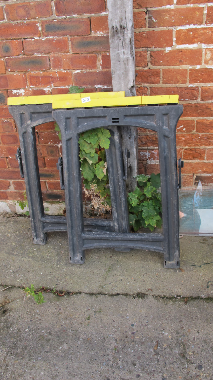 Lot 373: pair of decorators trestles