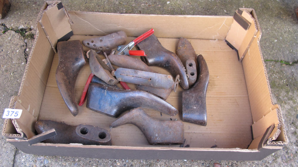 Lot 375: box of cobblers lasts/door stops