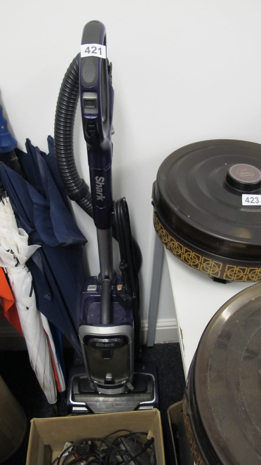 Lot 421: a Shark vacuum cleaner