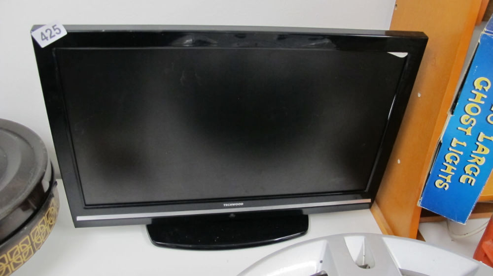 Lot 425: Technika television ideal for bedroom or kitchen with...