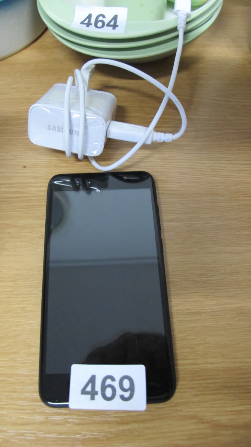 Lot 469: Bush android phone with charger in GWO