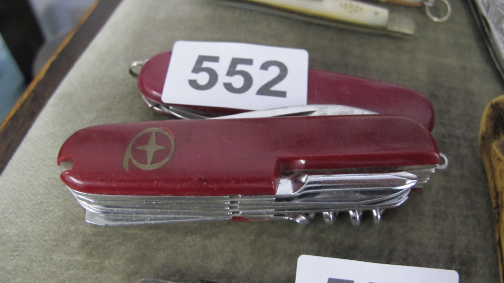 Lot 552: two swiss army knives
