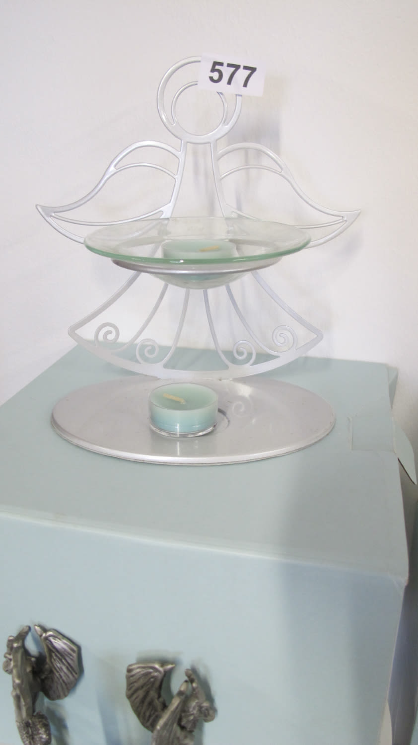 Lot 577: angel themed candle holder