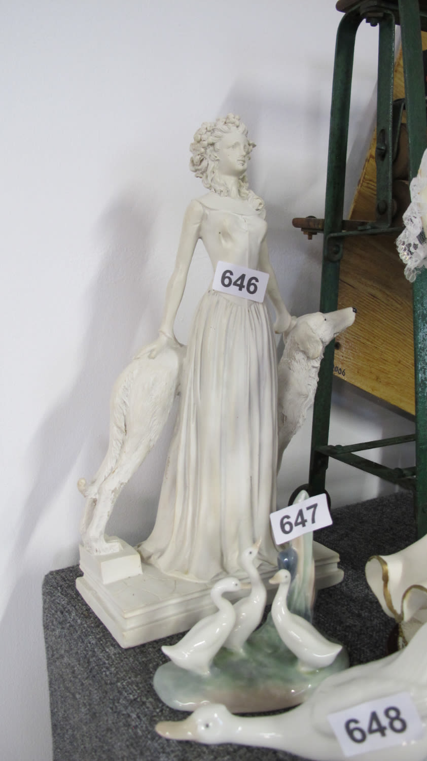 Lot 646: large lady and dog figurine
