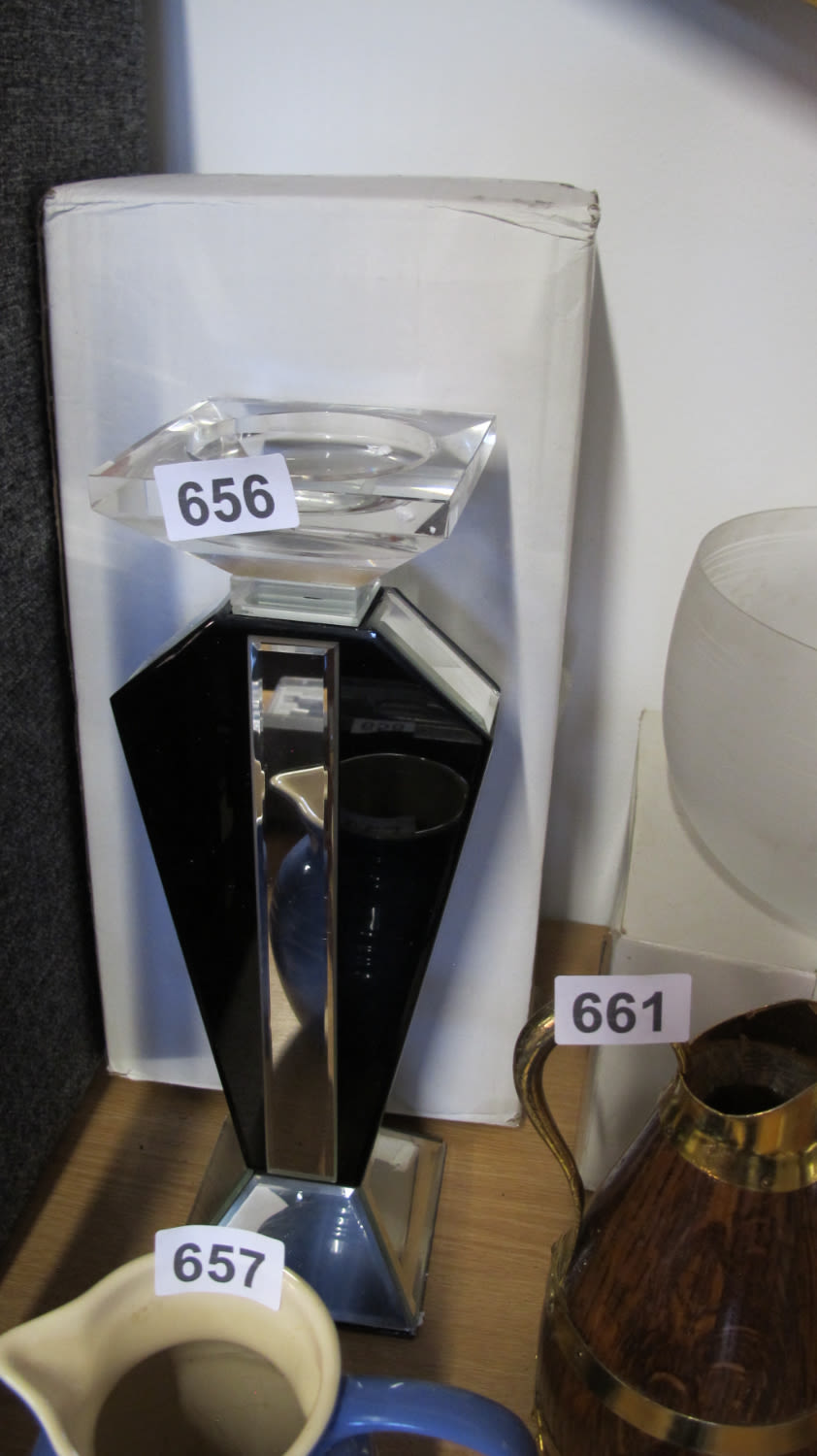 Lot 656: large glass candle holder