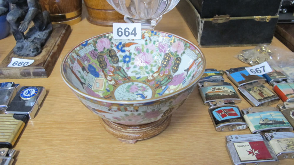 Lot 664: Chinese famille rose bowl on a wooden presentation...