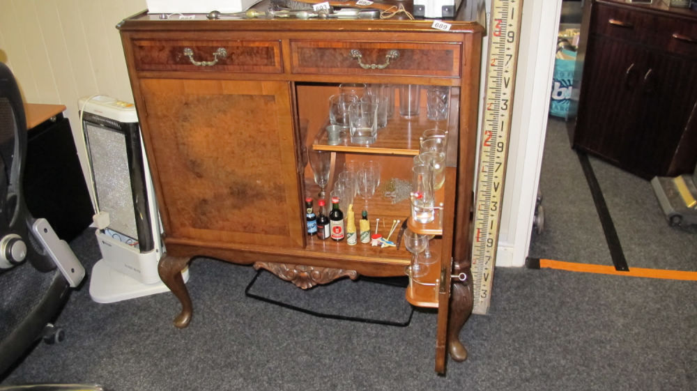 Lot 689: ornate cocktail drinks cabinet