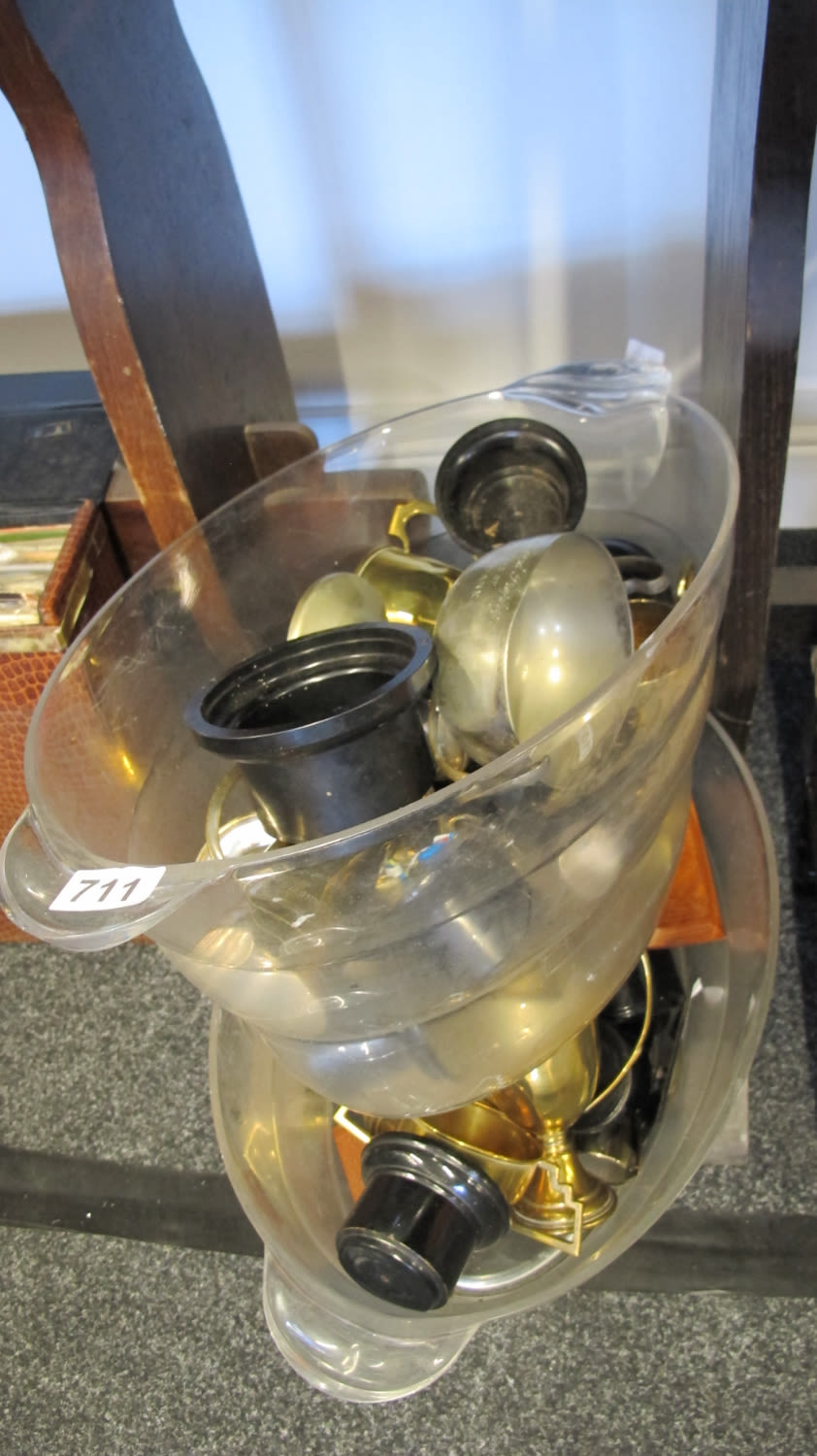 Lot 711: two tubs of various plated trophies