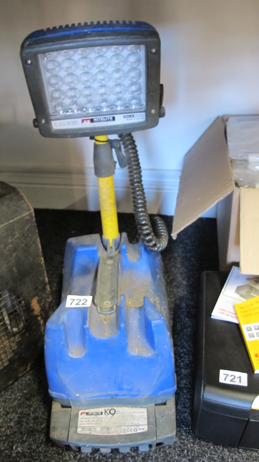 Lot 722: builders portable flood light. Needs a charger