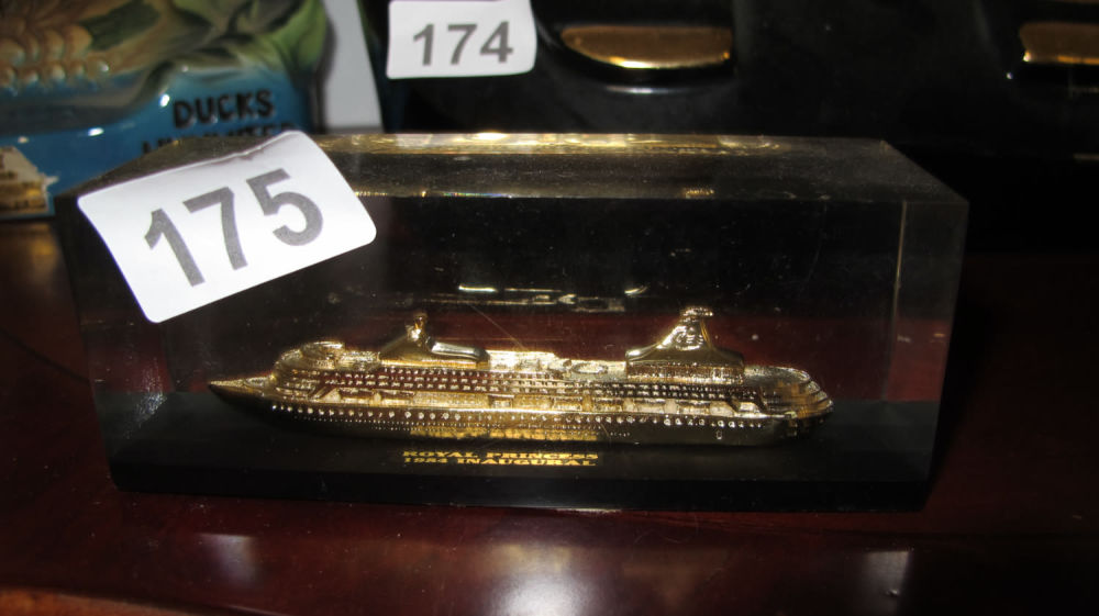Lot 175: Royal Princess 1984 Inaugural Paper weight gold