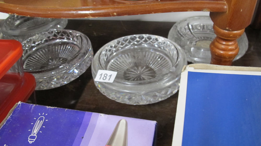Lot 181: four heavy crystal ash trays