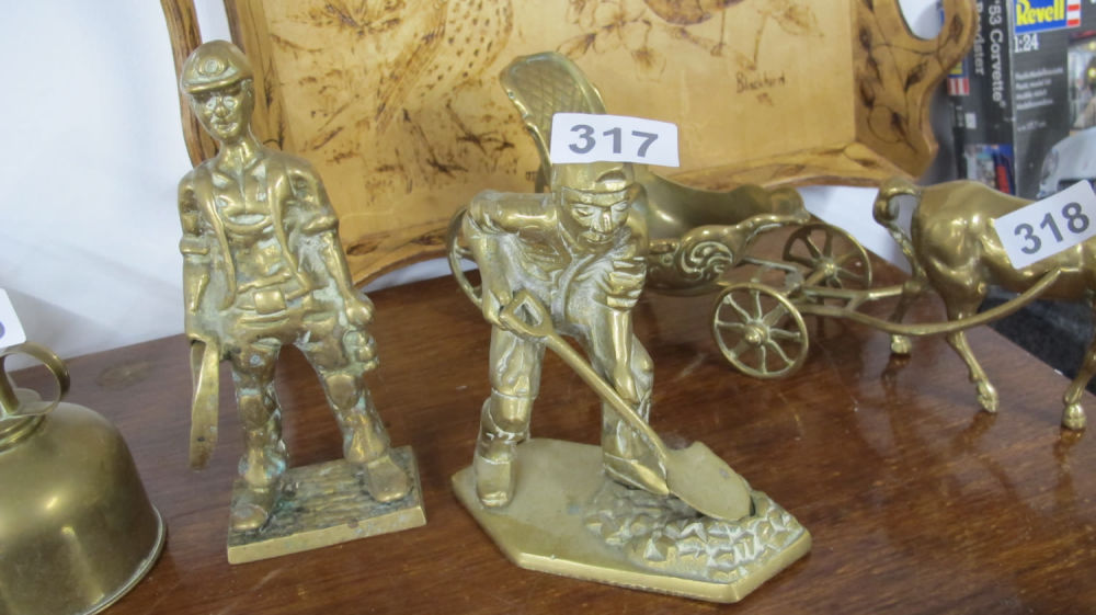Lot 317: 2 brass miner figures