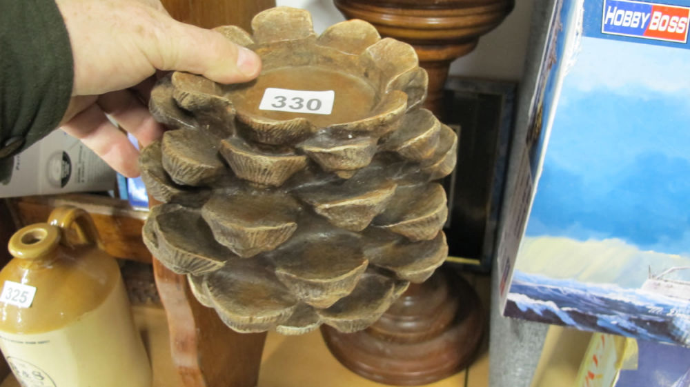 Lot 330: Pine cone themed heavy candle stand