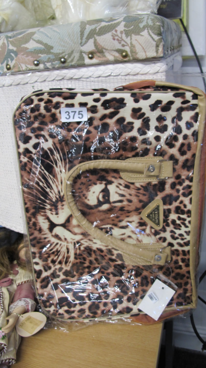 Lot 375: A leopard print handbag