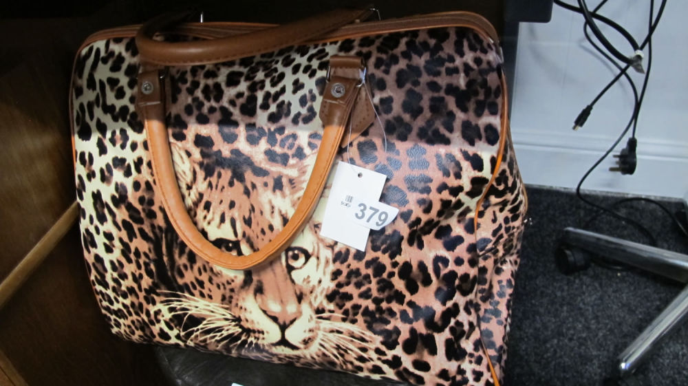 Lot 379: Another leopard print handbag. Because 1 wasn't enough