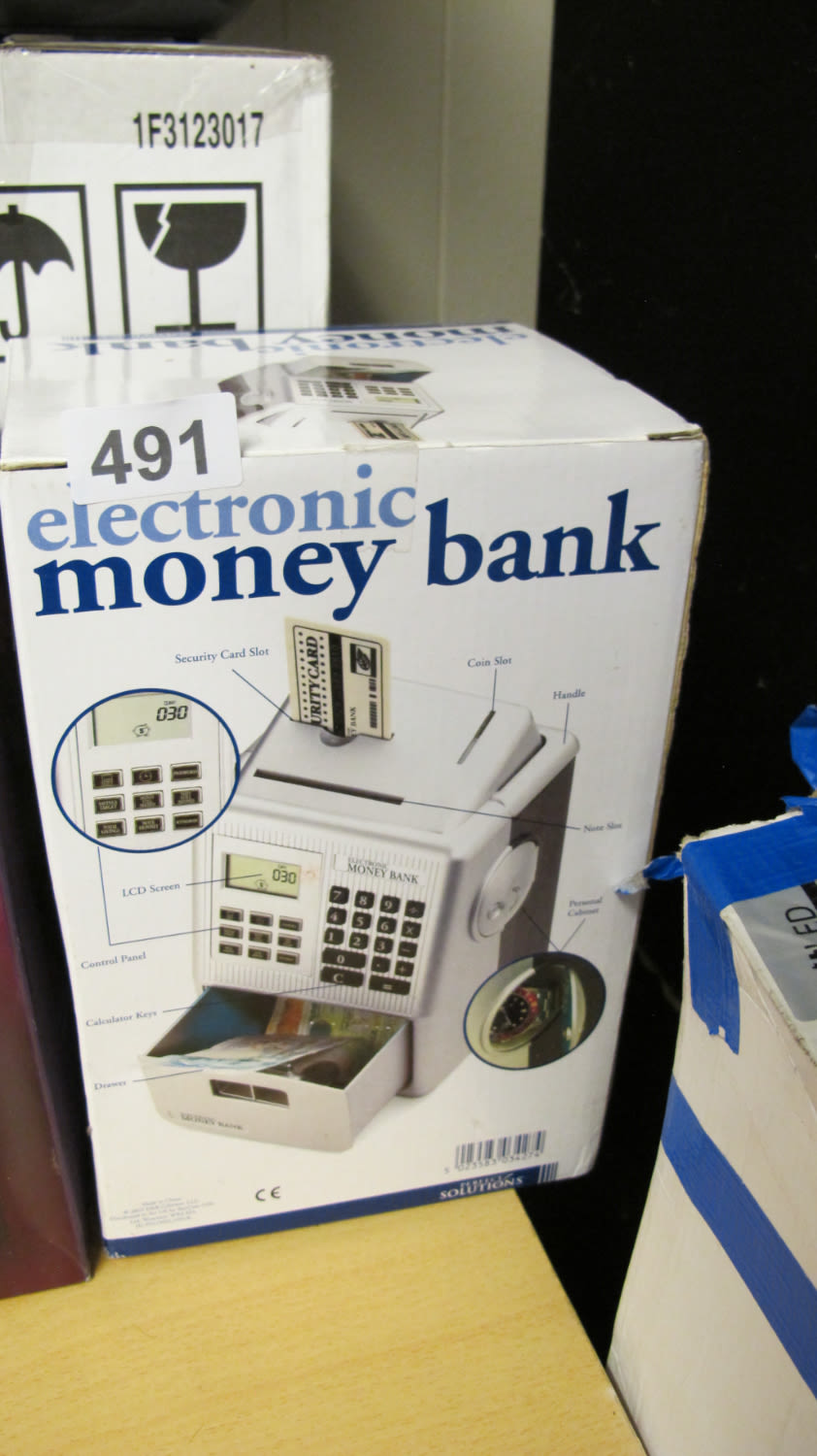 Lot 491: Boxed electric money bank