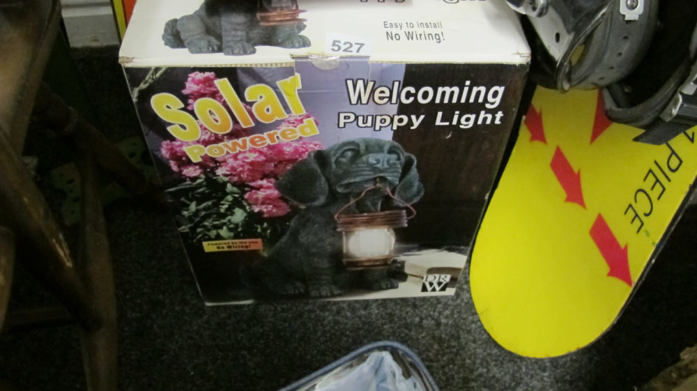 Lot 527: Solar powered puppy light