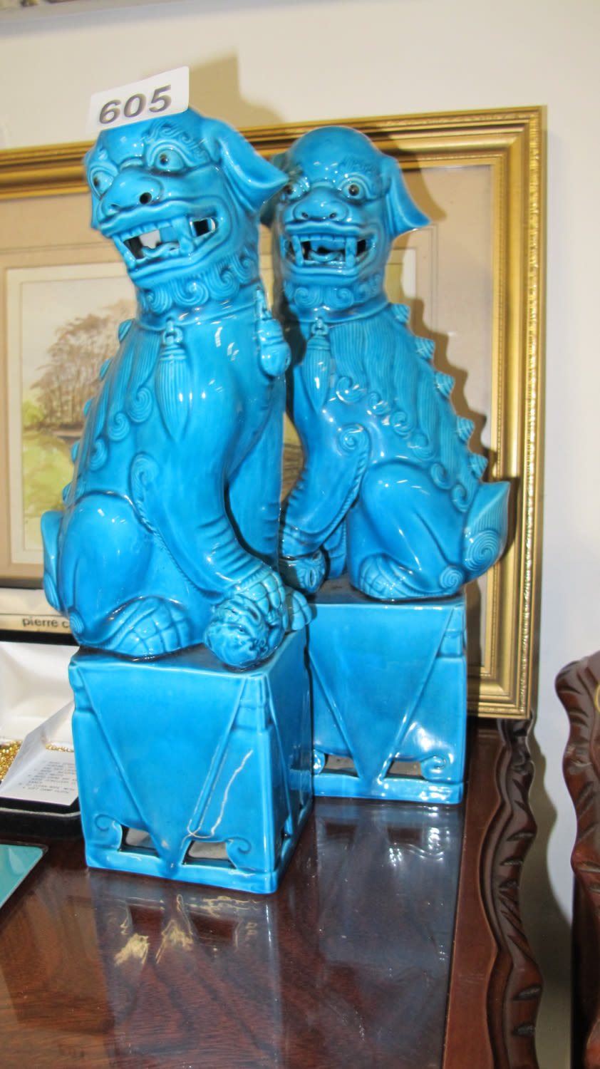 Lot 605: 2 Foo dogs