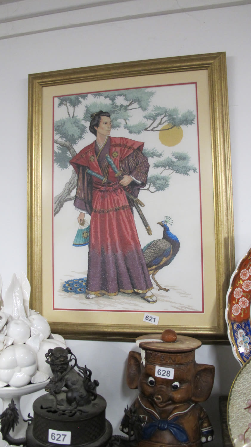 Lot 621: Framed cross stitch picture of a Japanese figure...