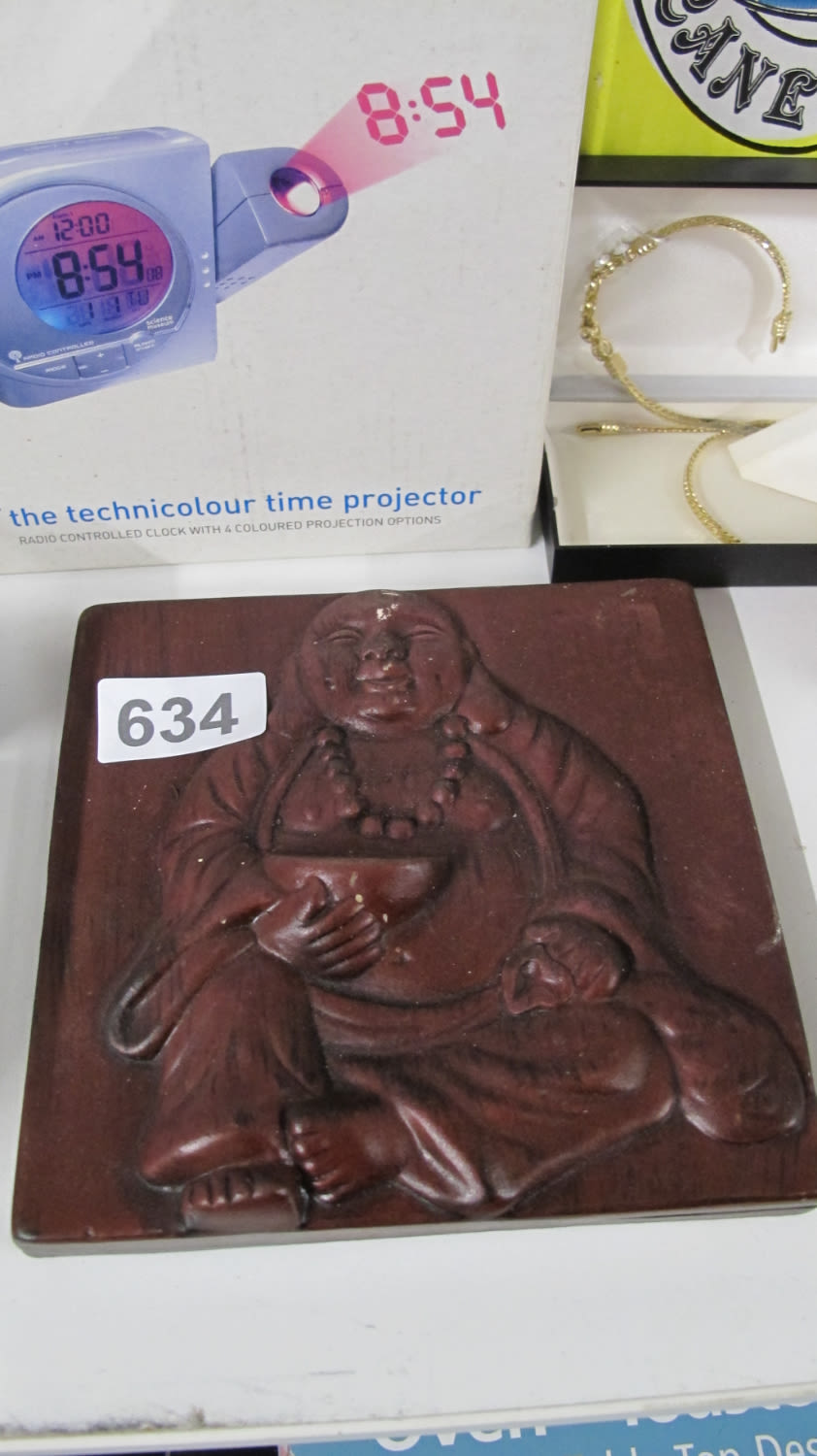 Lot 634: ***Wooden buddha plaque