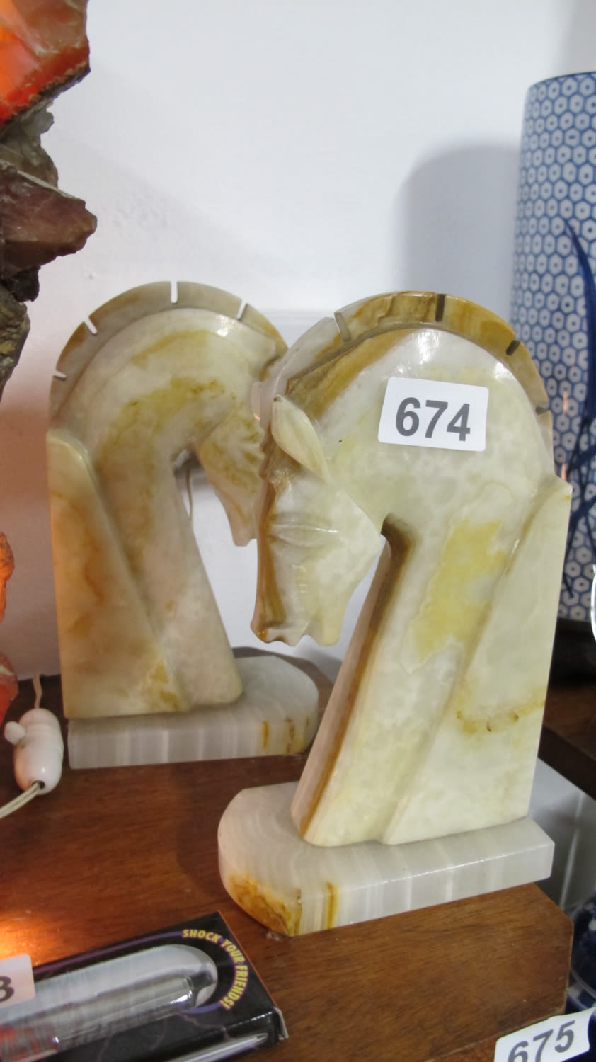 Lot 674: Pair of marble horse bookends
