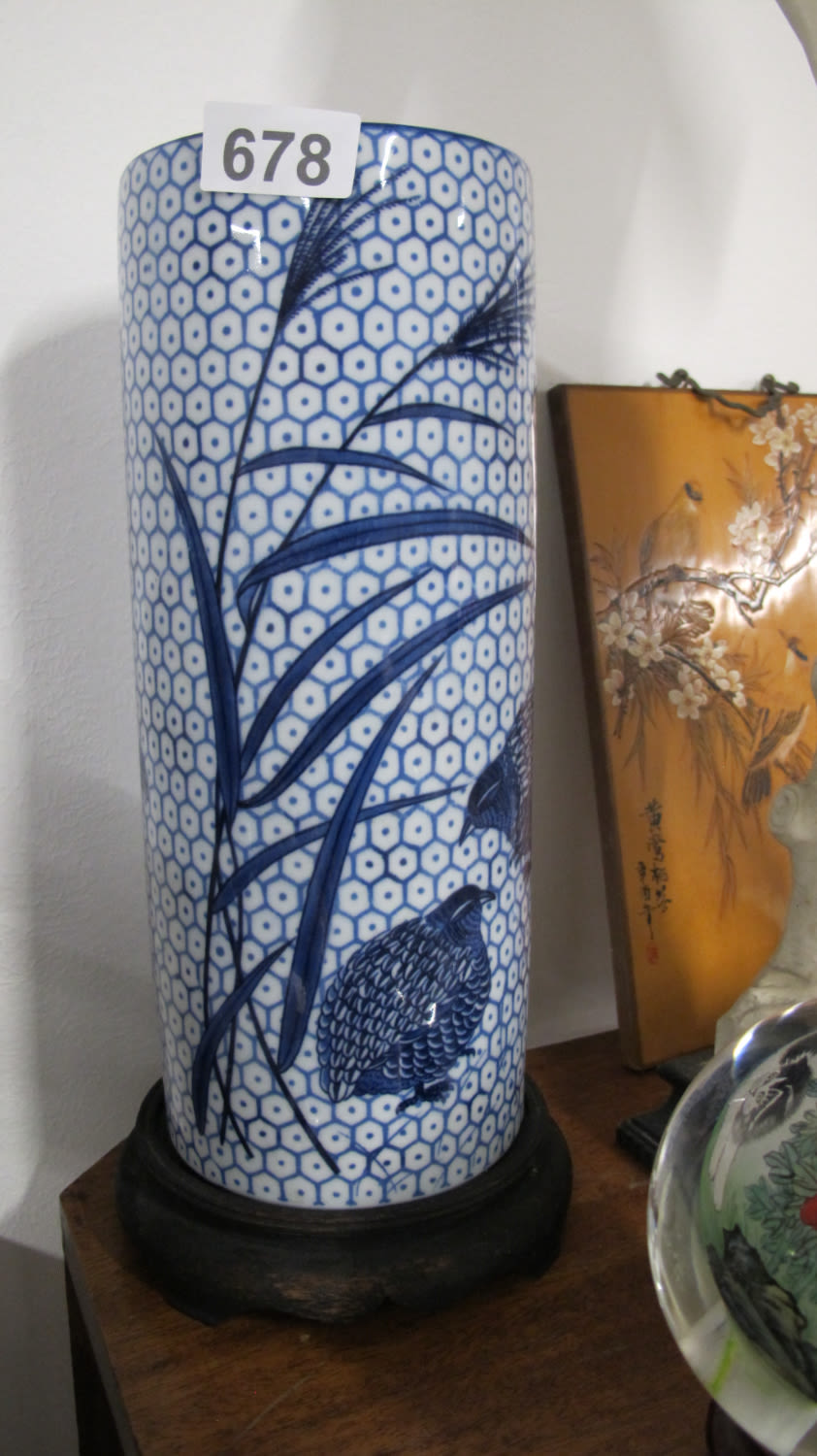 Lot 678: Oriental vase on a wooden base