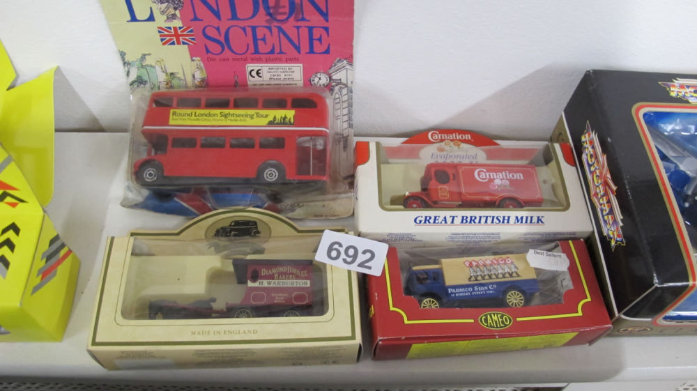 Lot 692: Quantity of collectors advertising vans and a London...