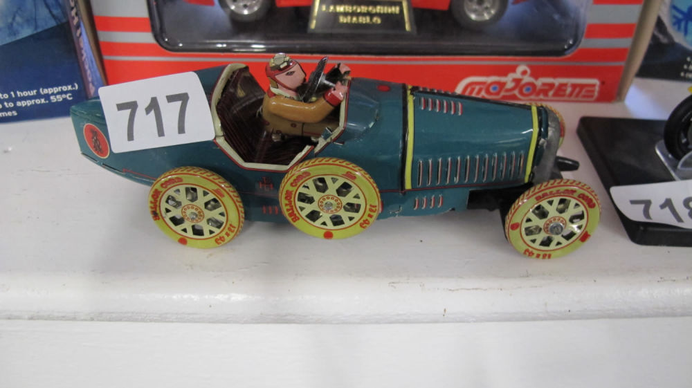 Lot 717: Tin plate toy