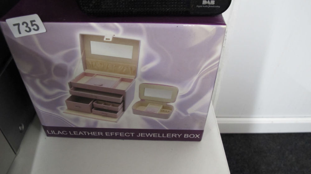 Lot 735: Boxed leather effect jewellery box