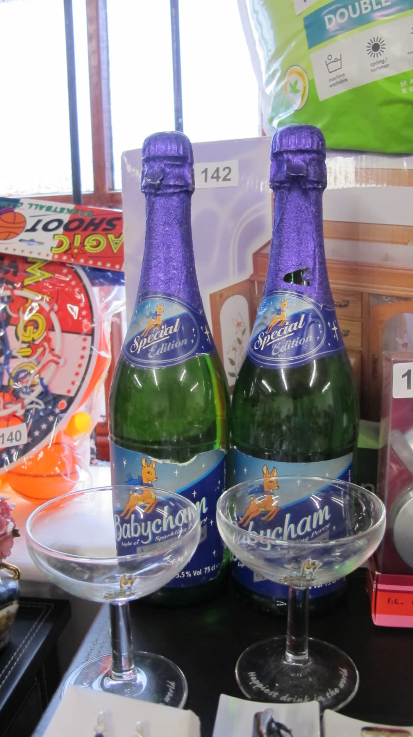 Lot 166: 2 bottles of special edition Babycham and glasses