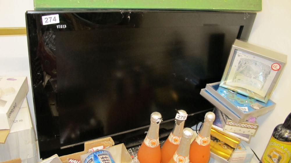 Lot 274: Panasonic tv. AF: damage to plastic on bottom...