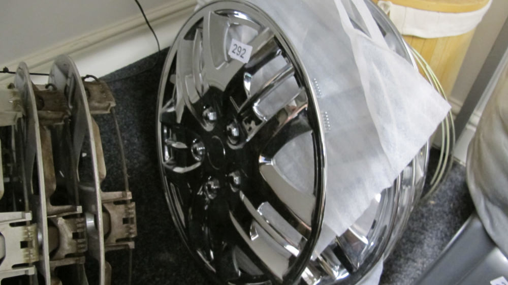 Lot 292: new Shiny chrome 16" wheel trims