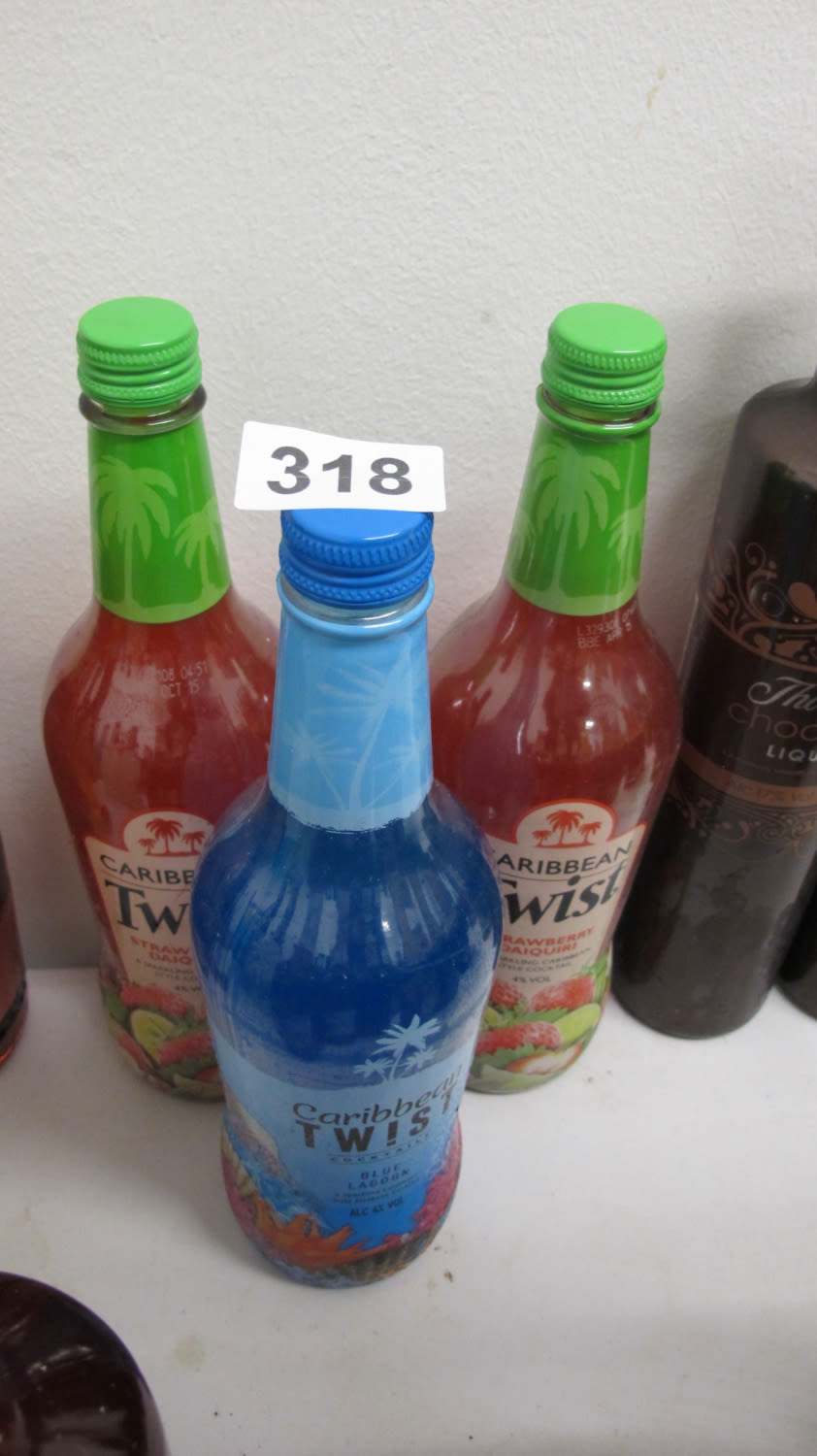 Lot 318: 3 bottles of Caribbean Twist