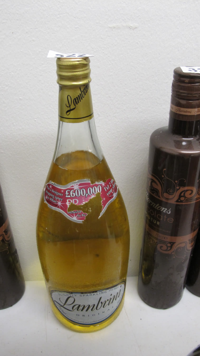 Lot 322: extra large bottle of Worksop Lambrini