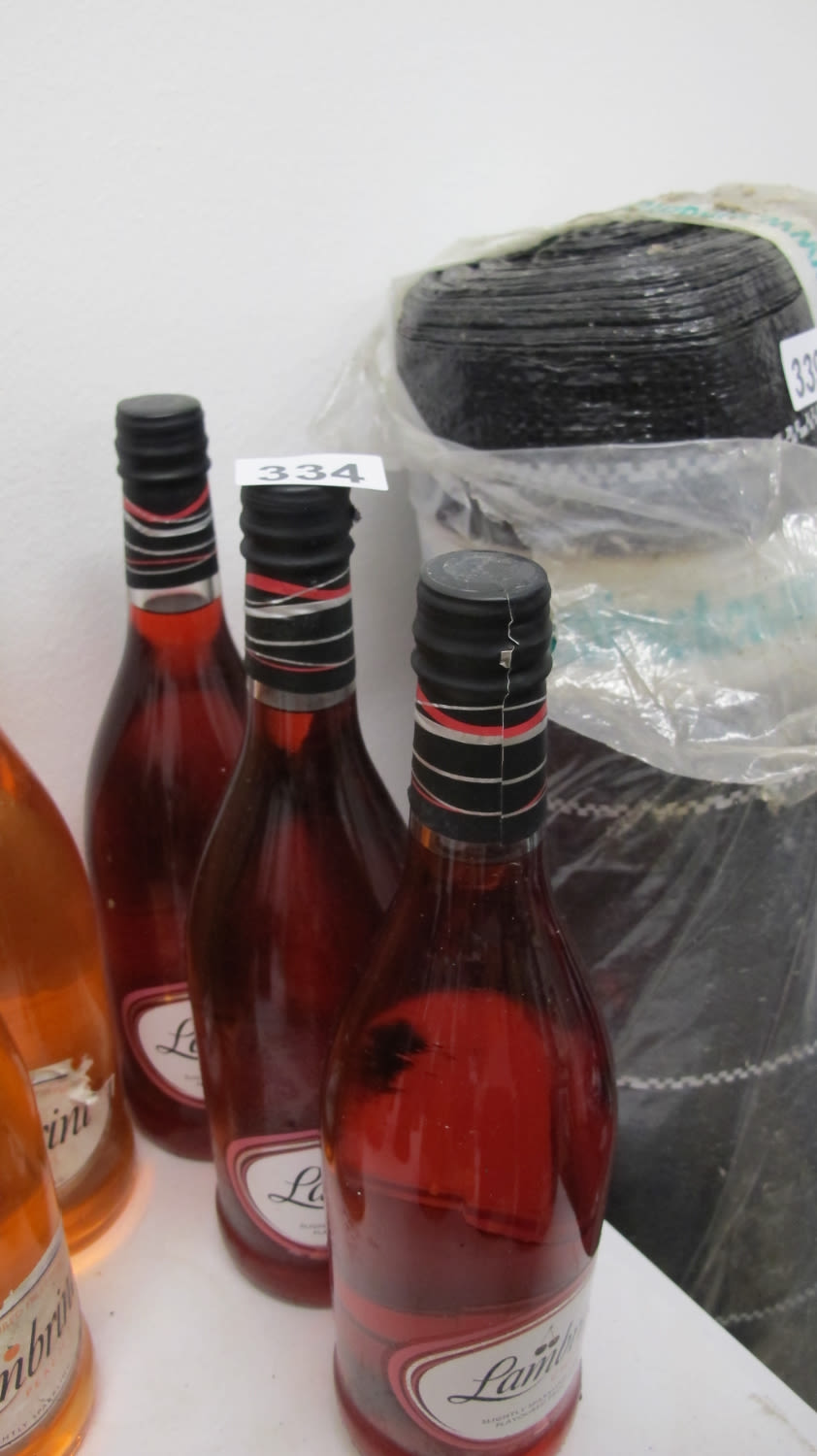 Lot 334: 3 bottles of Lambrini