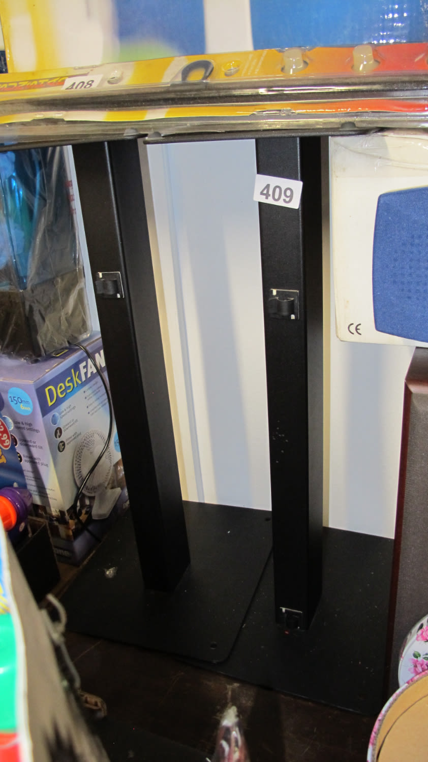 Lot 409: a pair of quality metal speaker stands 