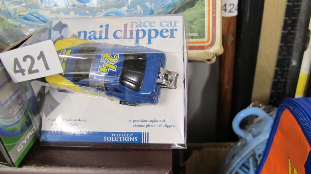 Lot 421: Race car nail clippers, for the man who...