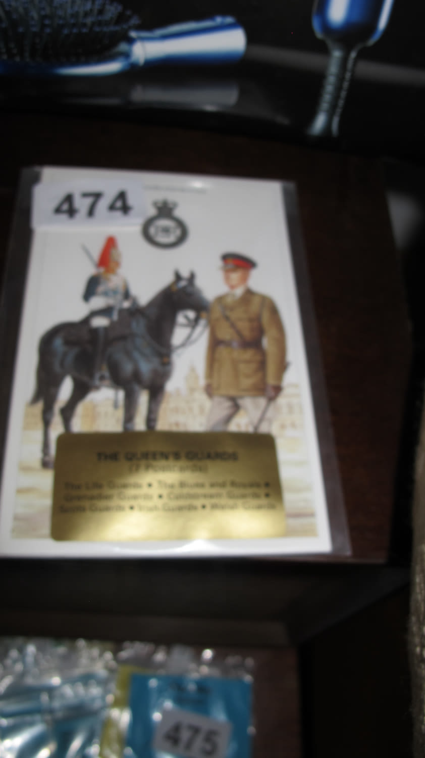 Lot 474: Set of The Queen's Guards postcards