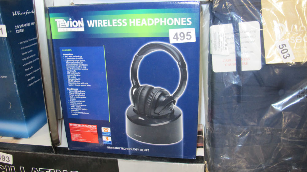 Lot 495: Boxed Tevion wireless headphones with charging dock