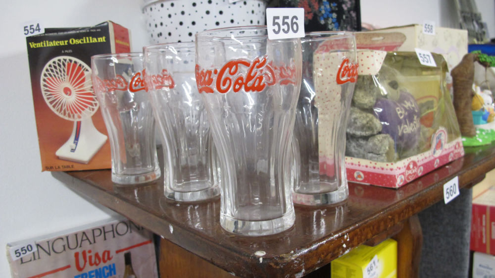 Lot 556: 6 original red embossed Coca cola glasses